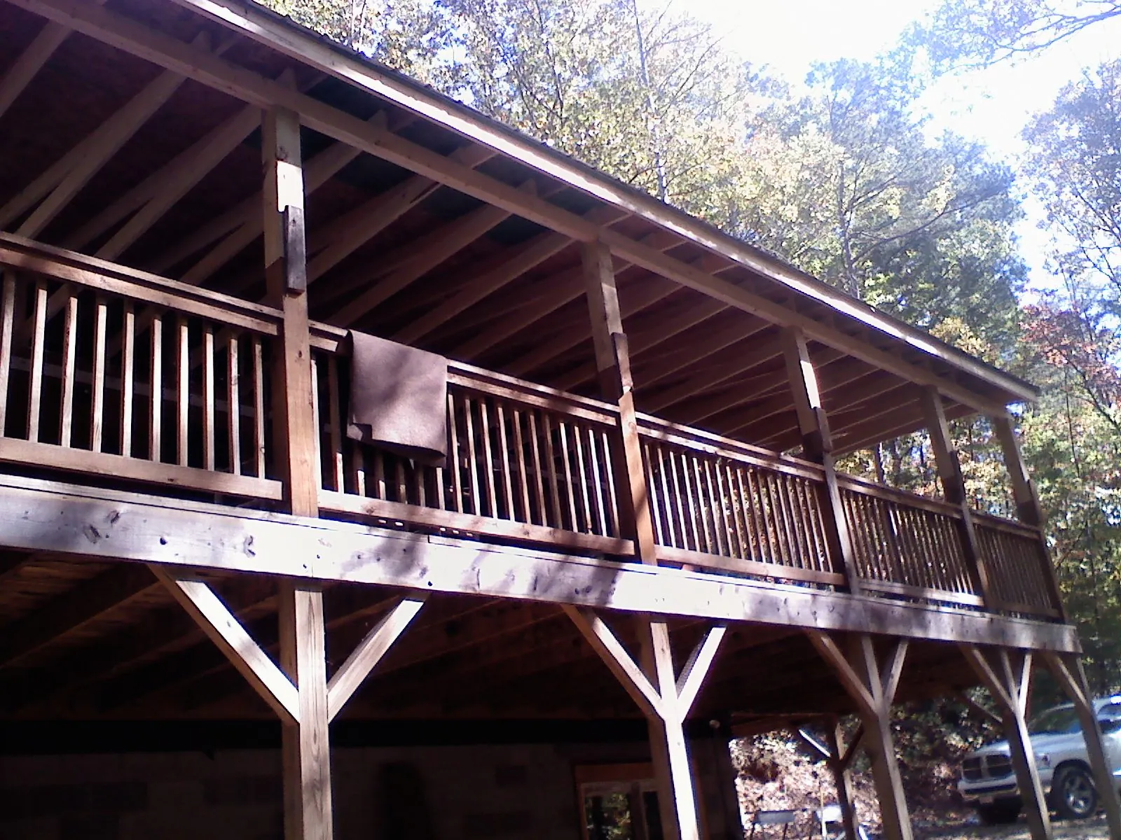 Timber framing under a new elevated porch and deck — Roof Leak Repair in Oldhams by Roofing Brothers
